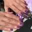 hands wearing DND DC Gel - 048 Electric Purple