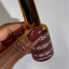 finger wearing DND DC Gel - 051 Light Macore