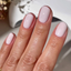 hands wearing DND DC Gel - 057 White Bunny