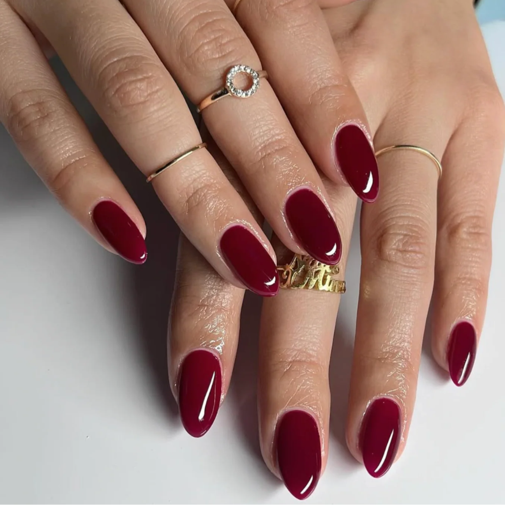 hands wearing DND DC Gel - 061 Wineberry
