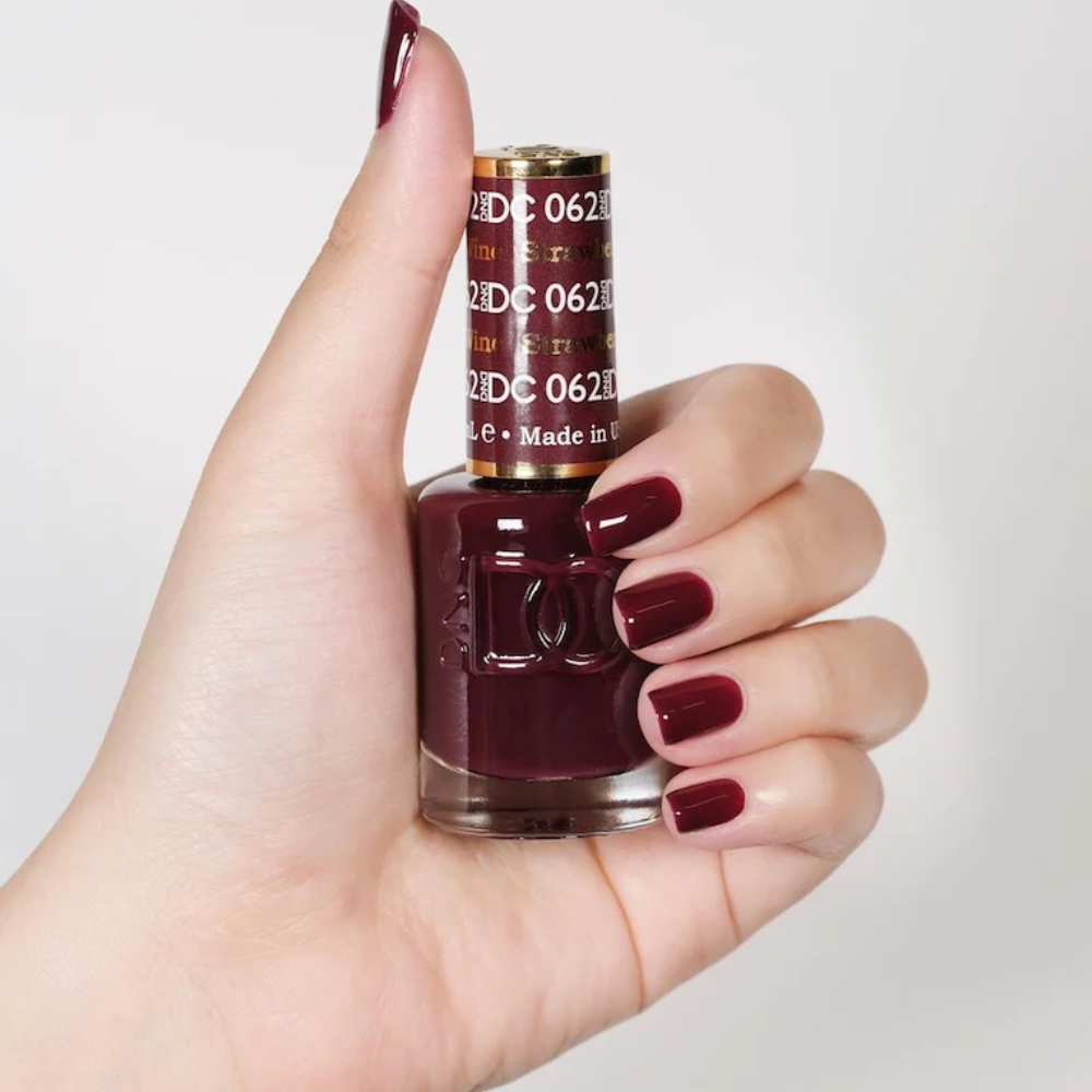 hands wearing DND DC Gel - 062 Strawberry Wine