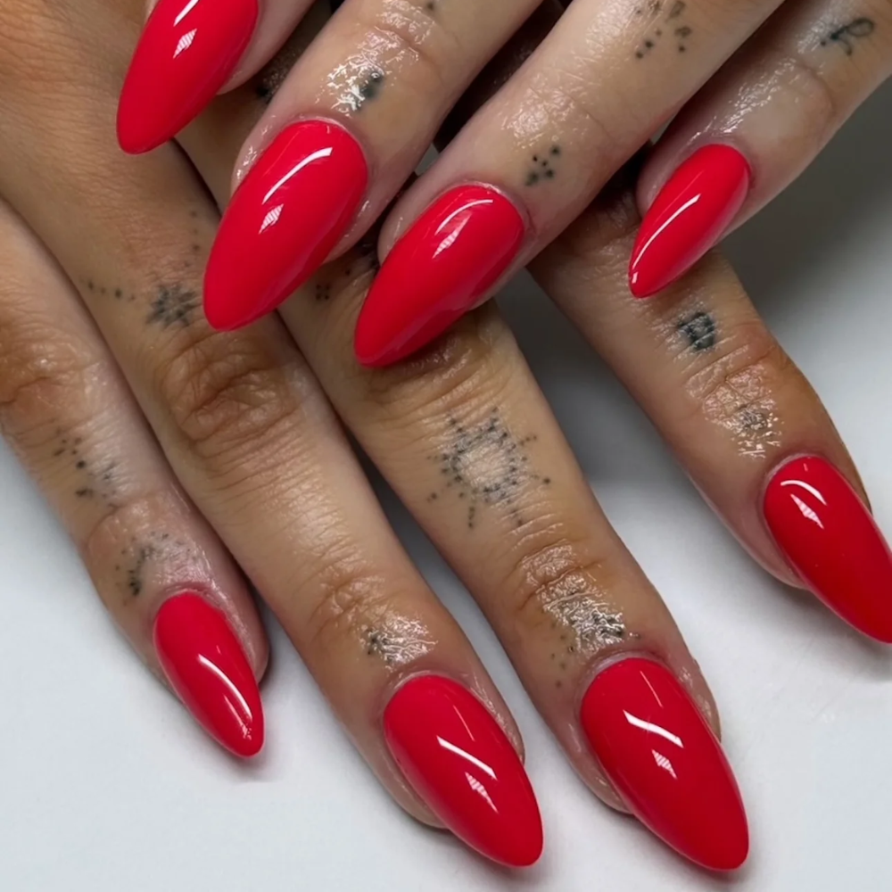 hands wearing DND DC Gel - 065 Thai Chili Red