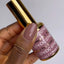 finger wearing DND DC Gel - 074 Naked Tan