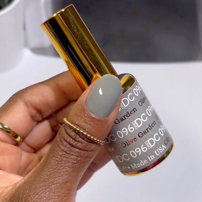 finger wearing DND DC Gel - 096 Olive Garden