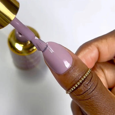 finger wearing DND DC Gel - 106 Cherry Rose
