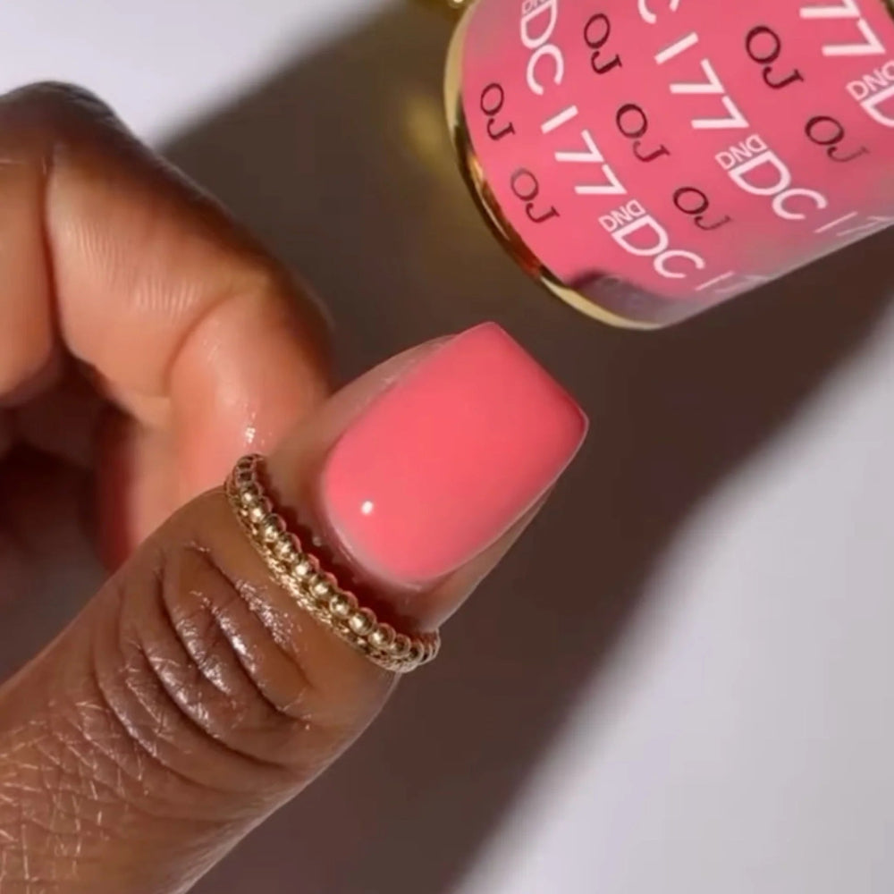 finger wearing DND DC Gel - 177 OJ