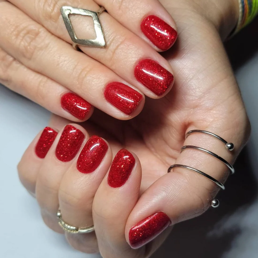 Hands wearing DND Gel 402 Firework Star