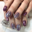 Hands wearing DND Gel 411 Shooting Star
