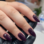 Hands wearing DND Gel 428 Rosewood