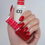 Hands wearing DND Gel 431 Raspberry