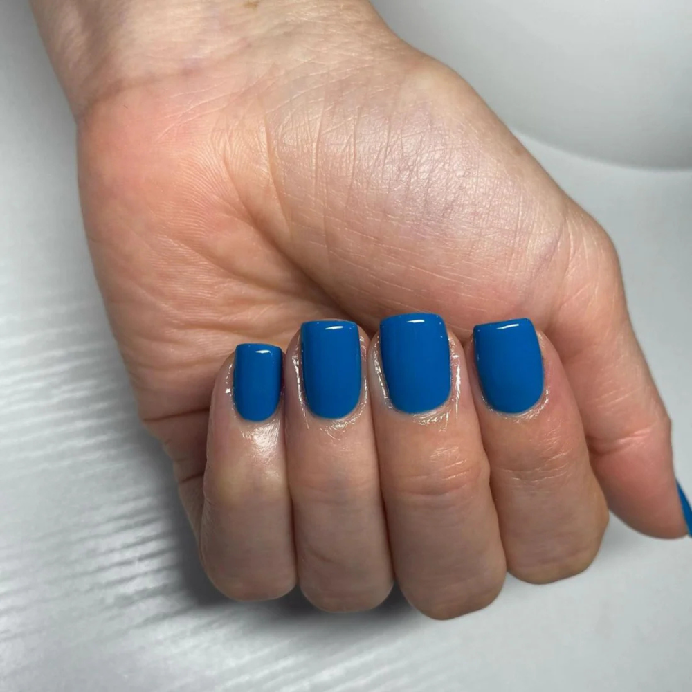 Hands wearing DND Gel 437 Blue De France