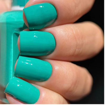 Hands wearing DND Gel 438 Island Oasis