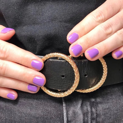 Hands wearing DND Gel 439 Purple Spring