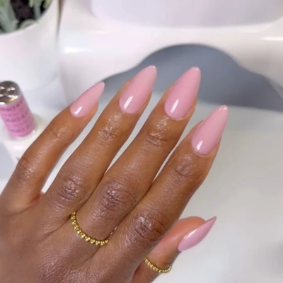 Hands wearing DND Gel 449 First Kiss