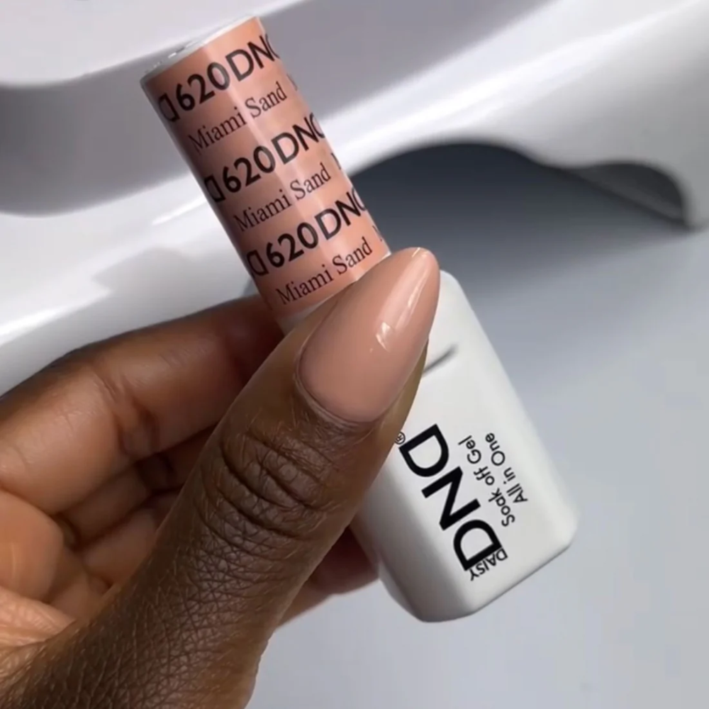 hand holding DND single gel polish 620 Miami Sand