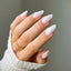 hands wearing DND Gel Polish - 1234 Cute Bunny (2222)