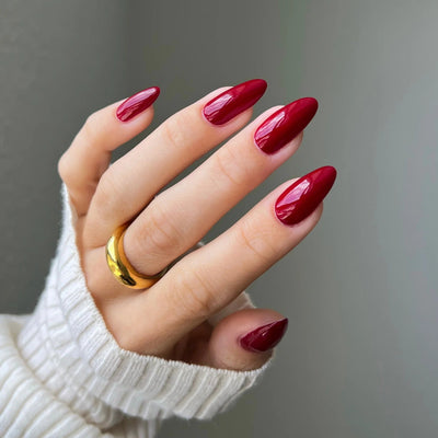 hands wearing DND Gel Polish - 456 Cherry Berry