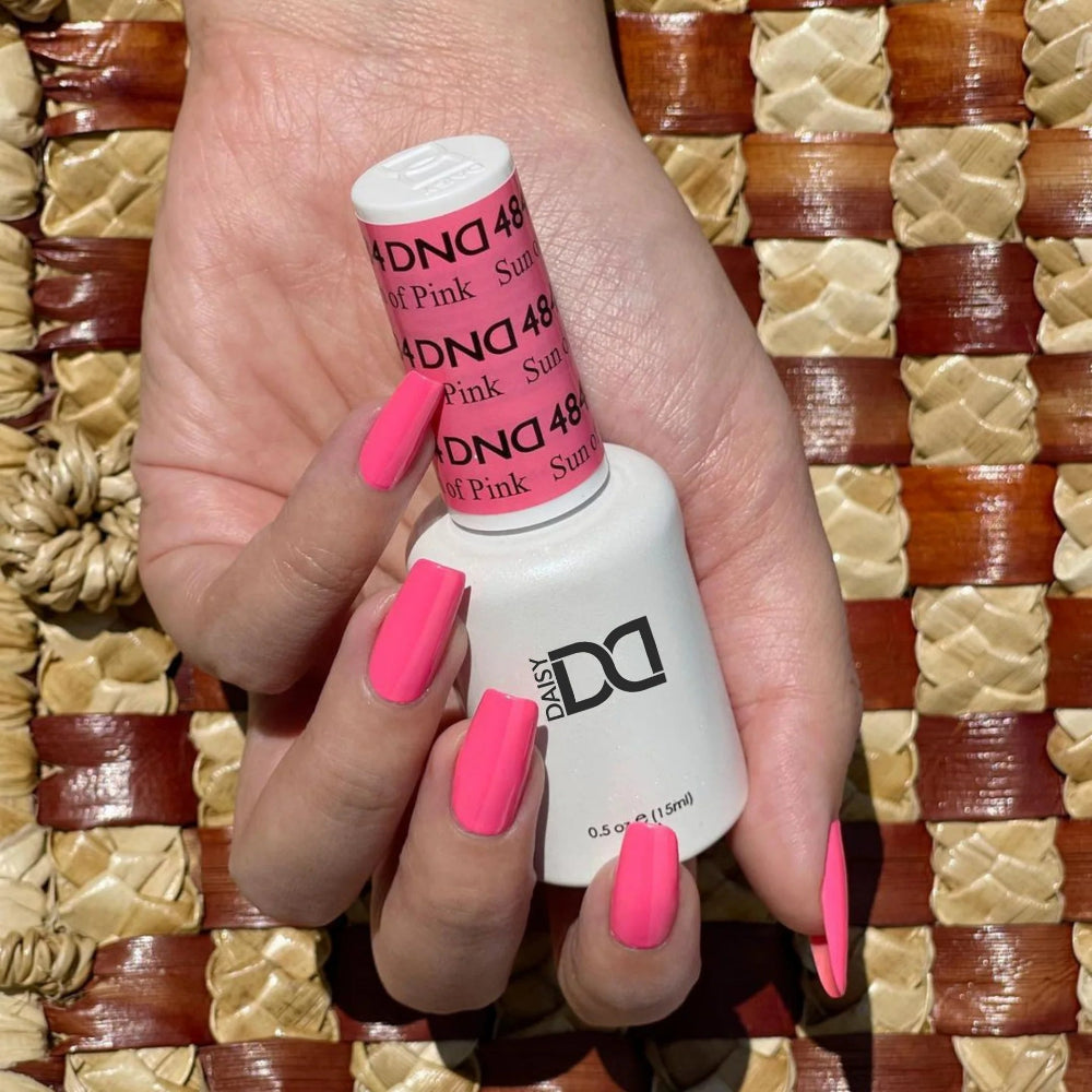 hands wearing DND Gel Polish - 484 Sun of Pink