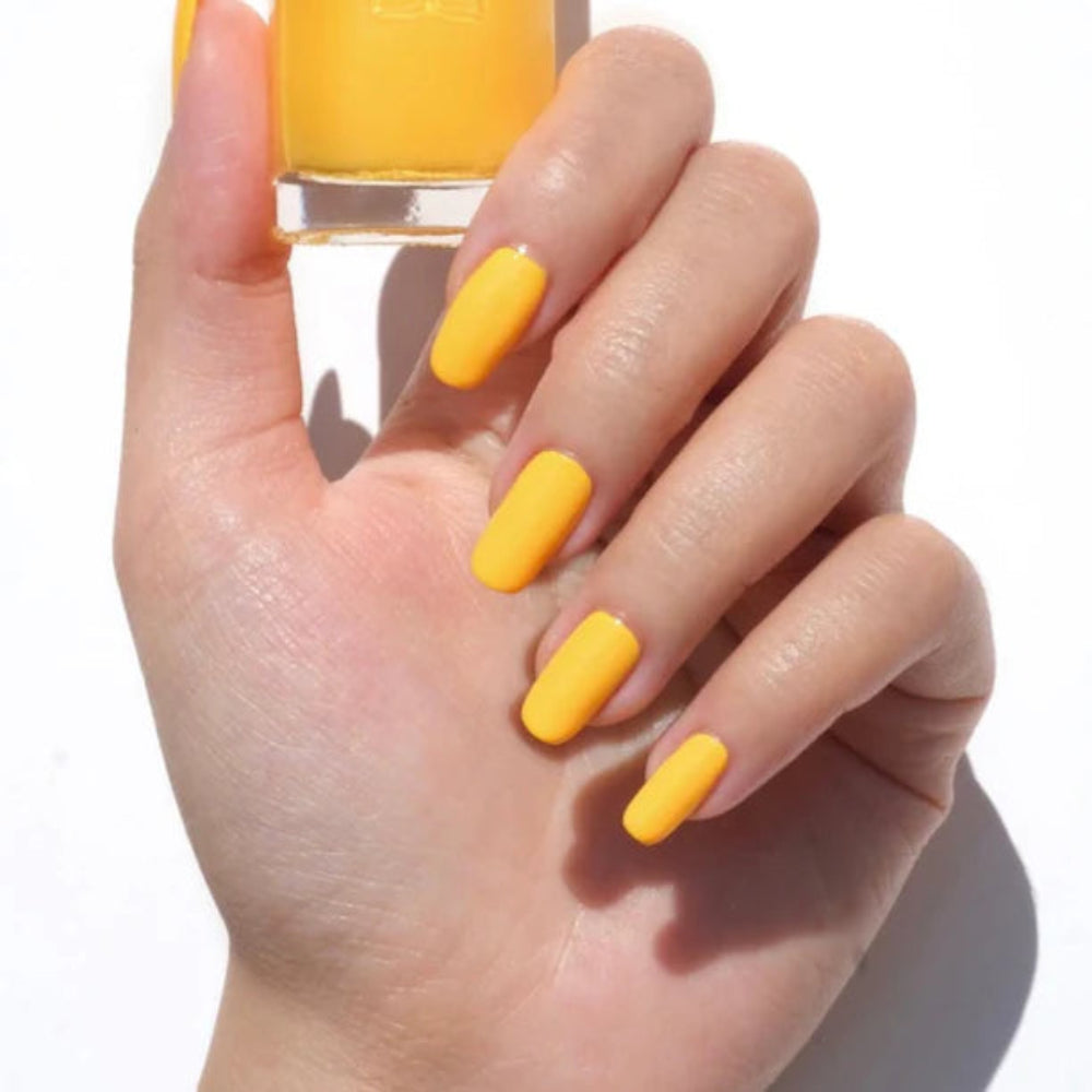 hands wearing DND Gel Polish 506 Summer Sun