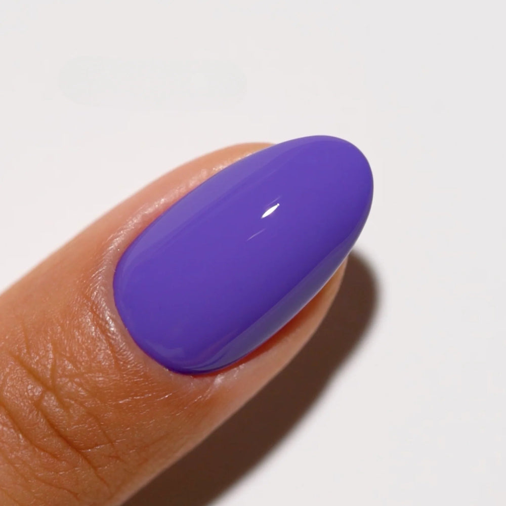 finger wearing DND Gel Polish 737 Crushed Grape