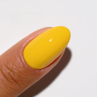 finger wearing DND Gel Polish 746 Buttered Corn