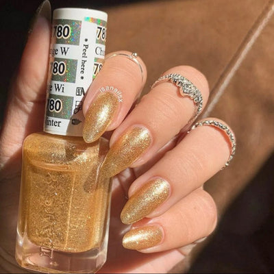 hands wearing DND Gel Polish 780 Champagne Winter