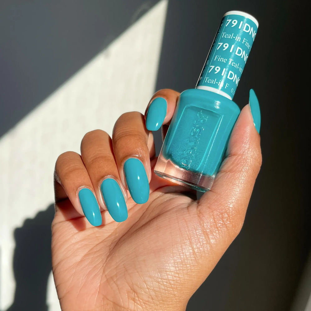 hands wearing DND Gel Polish 791 Teal-in Fine