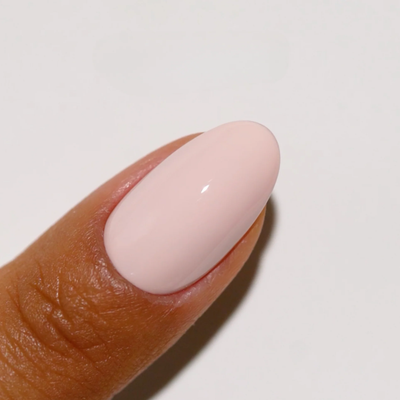 finger wearing DND Gel Polish - 987 Birthday Suit
