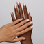 hands wearing DND Gel Polish - 988 Peach It To Me
