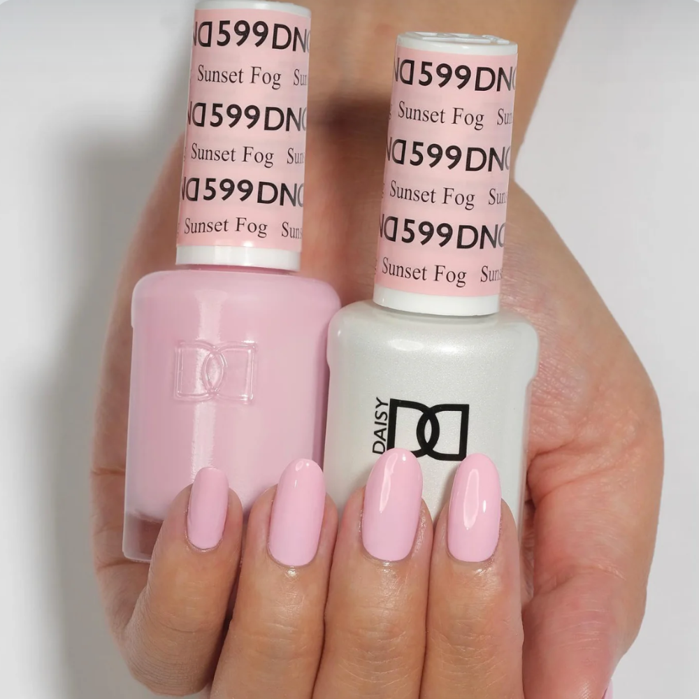 hands wearing DND Gel Polish 599 Sunset Fog