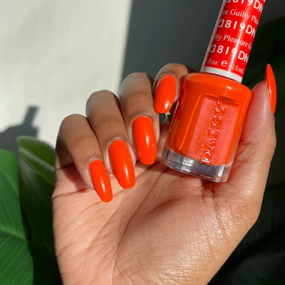 hands wearing DND Gel Polish 819 Guilty Pleasure