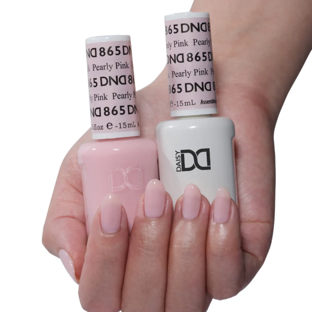 hands wearing DND Trio - 865 Pearly Pink