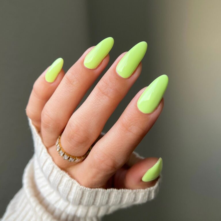 hands wearing 117 Dewy Limeade Gel & Polish Diva Duo by DND