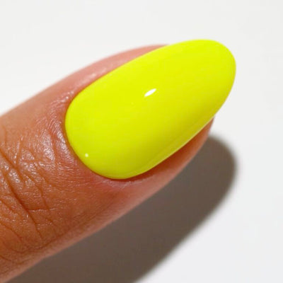 hands wearing 188 Highlighter Yellow Gel & Polish Diva Duo by DND