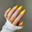 hands wearing 204 Marigold Gel & Polish Diva Duo by DND