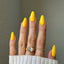 hands wearing 204 Marigold Gel & Polish Diva Duo by DND (2)