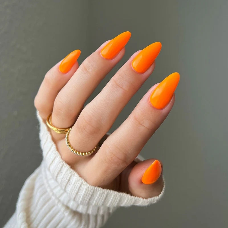 hands wearing DND Diva 208 Perfect Orange