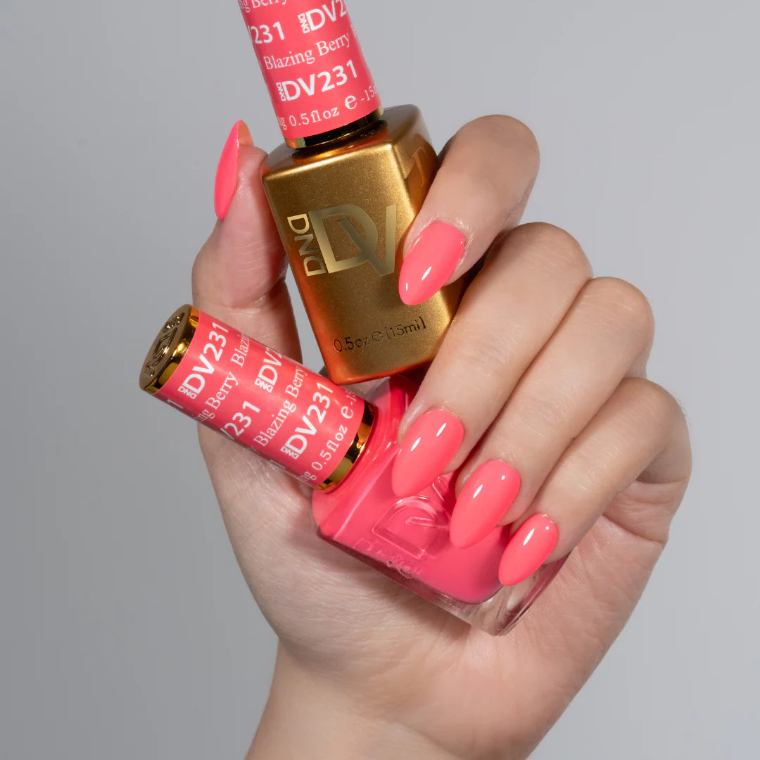 hands wearing 231 blazing berry Diva Gel & Polish Duo by DND