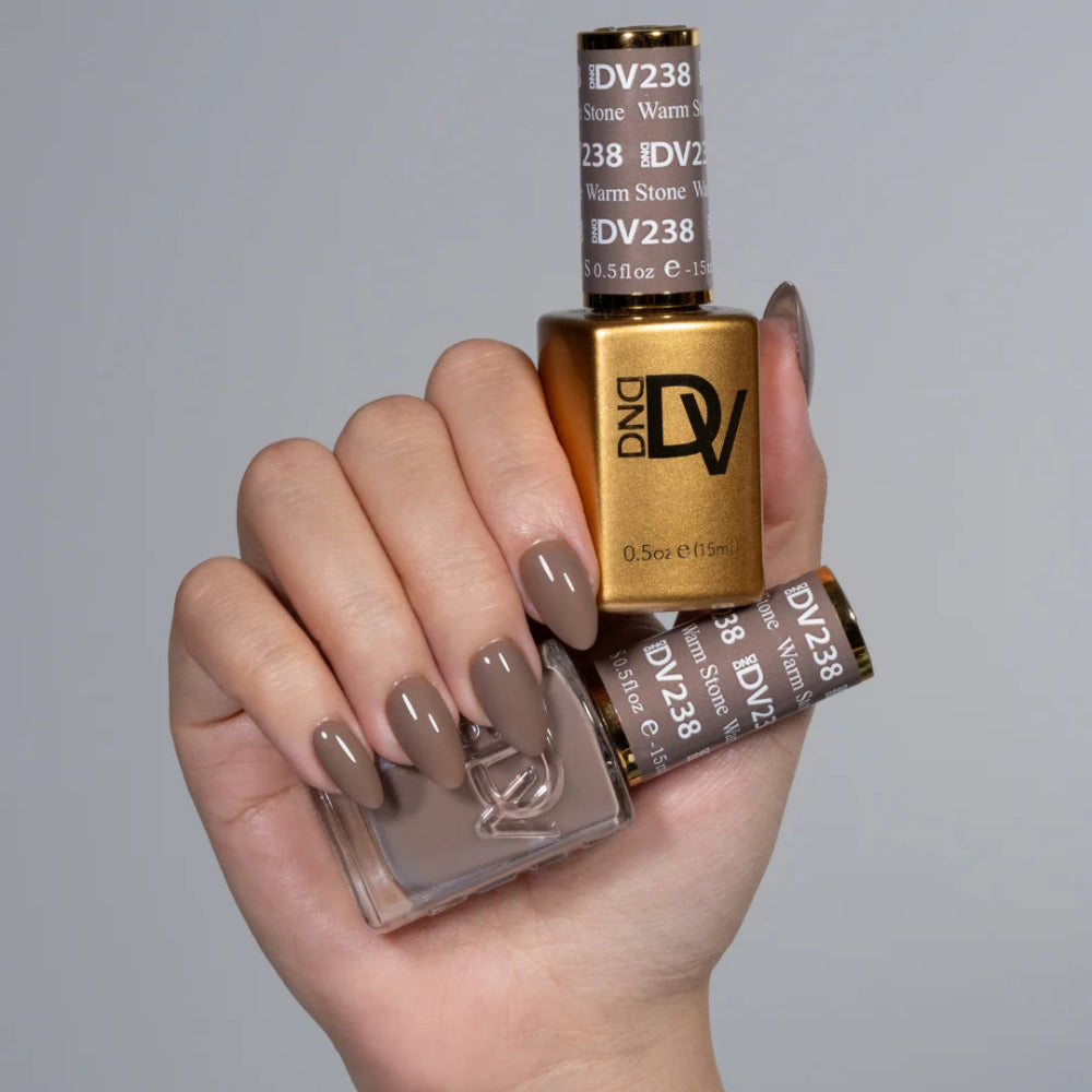 hands wearing 238 Warm stone Diva Gel & Polish Duo by DND