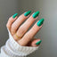 hand wearing 243 Imperial Jade gel polish by DND Diva