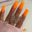 hands wearing OG223 Orange U Cute Gel & Polish Duo by Notpolish