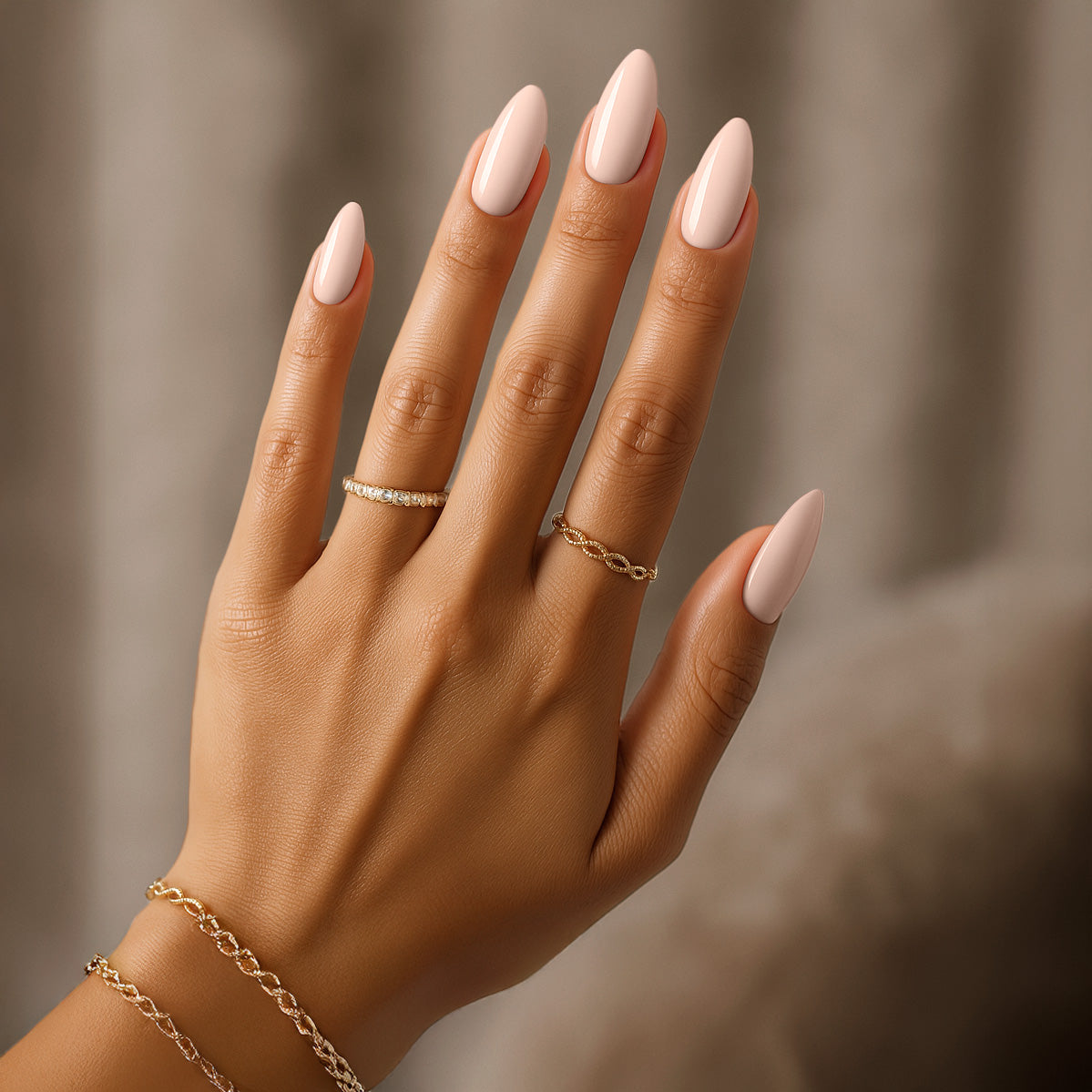 hands wearing Chaun Legend Gel Beige Instinct