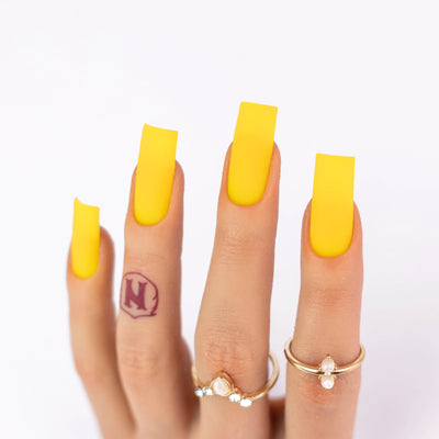 hands wearing M104 Yellow Mamba Matching Trio by Notpolish