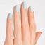 hands wearing M83 Mexico City Move-mint Intelli-Gel Duo by OPI