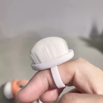 Mini Dust Brush Ring on finger