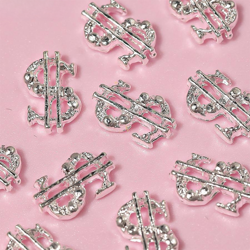 Silver money sign nail charms with crystal accents for luxury nail art, acrylic nails, gel nails, and press-on nail designs.