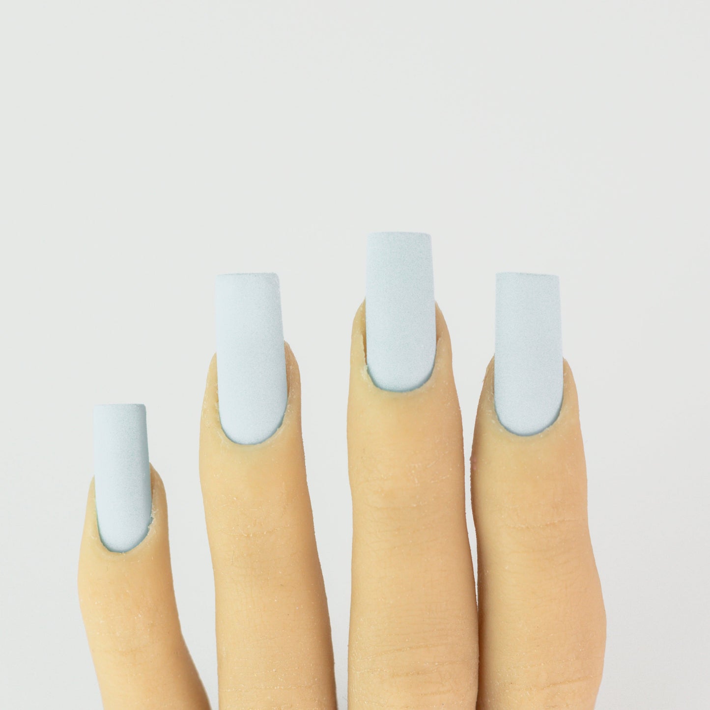 hands wearing OG107 Azure Gel & Polish Duo by Notpolish