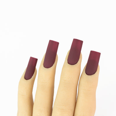 hands wearing OG112 Wine And Dine Trio by Notpolish