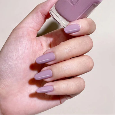 hands wearing DND 605 Dovetail Gel & Polish Duo