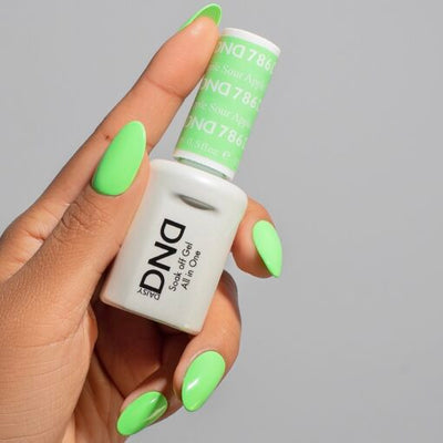 Hands wearing 786 Sour Apple Trio by DND